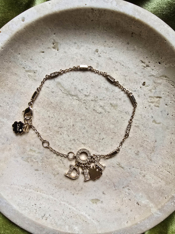 Dior Gold-Tone Charm Bracelet with Logo & Clover