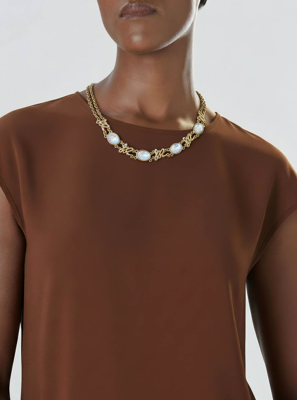 Collier Sonia Rykiel vintage plaqué or - Maillons entrelacés et strass ovales transparents