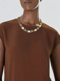 Collier Sonia Rykiel vintage plaqué or - Maillons entrelacés et strass ovales transparents