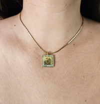Vintage 1980 Givenchy Logo Pendant Necklace – Gold Tone with Rhinestone Border