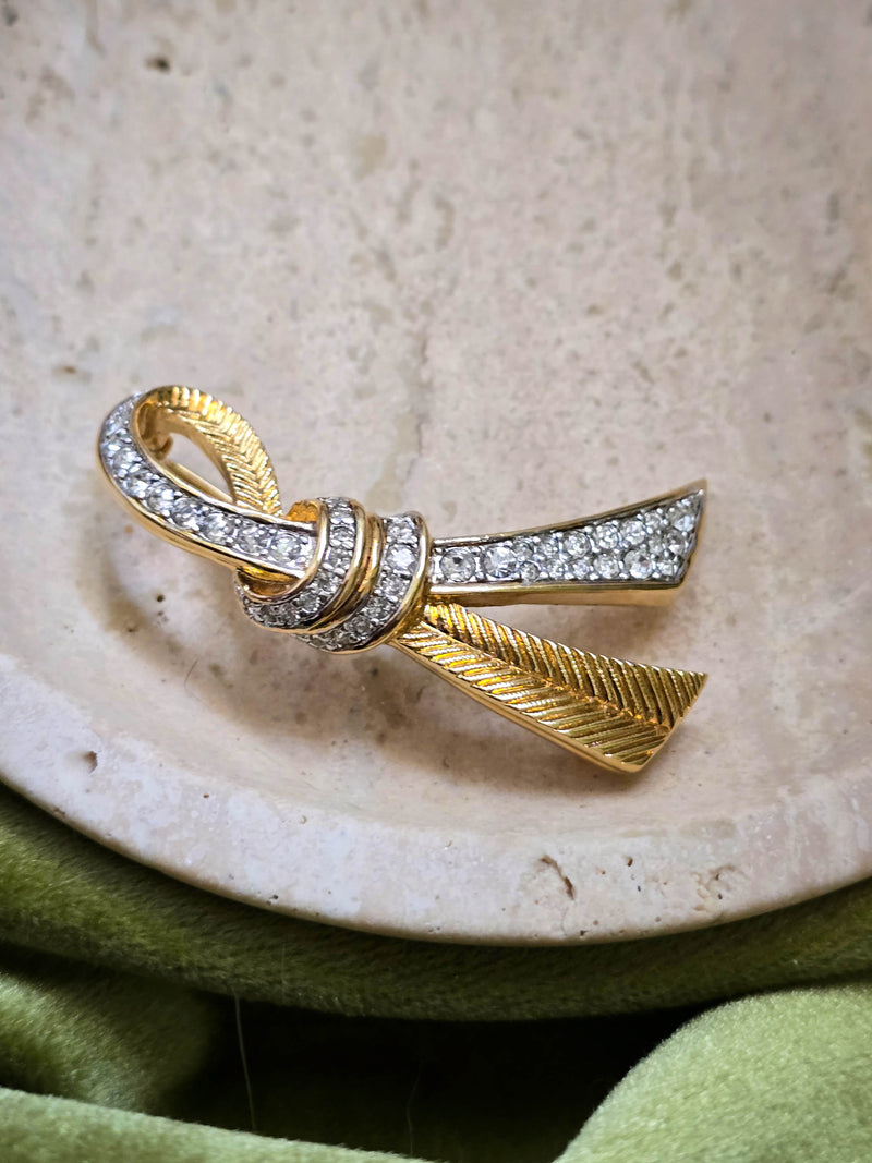 Vintage Nina Ricci Gold-Tone Ribbon Brooch with Rhinestones