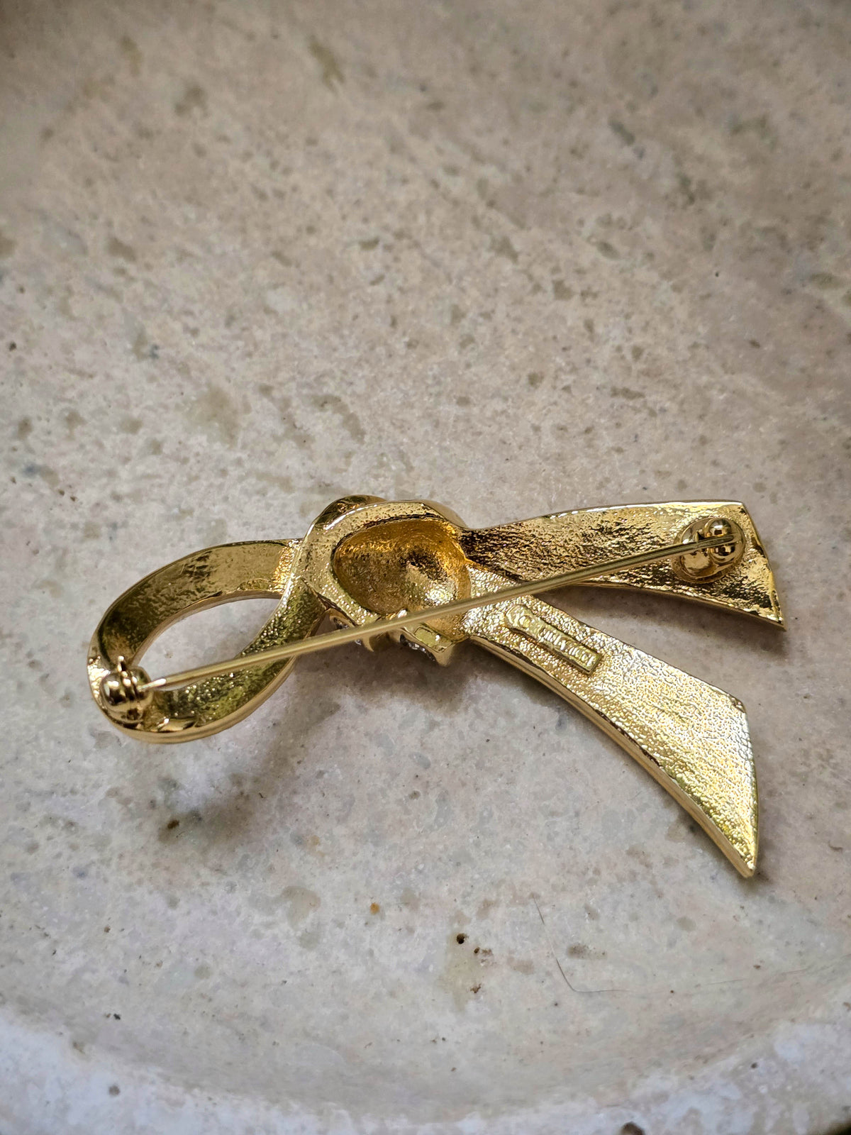 Vintage Nina Ricci Gold-Tone Ribbon Brooch with Rhinestones