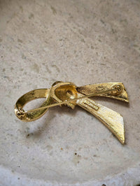Vintage Nina Ricci Gold-Tone Ribbon Brooch with Rhinestones