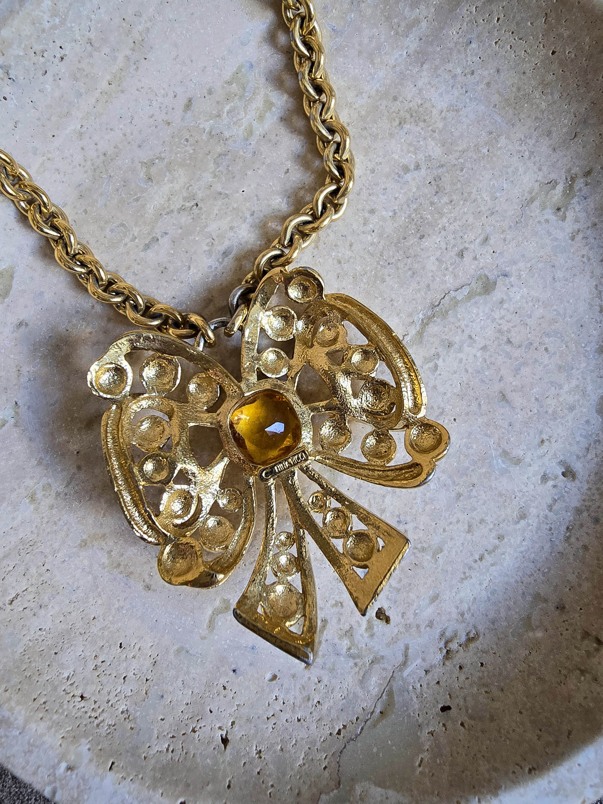 Vintage Nina Ricci Gold Bow Necklace with Amber Glass Center