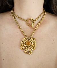 Vintage Nina Ricci Gold Bow Necklace with Amber Glass Center