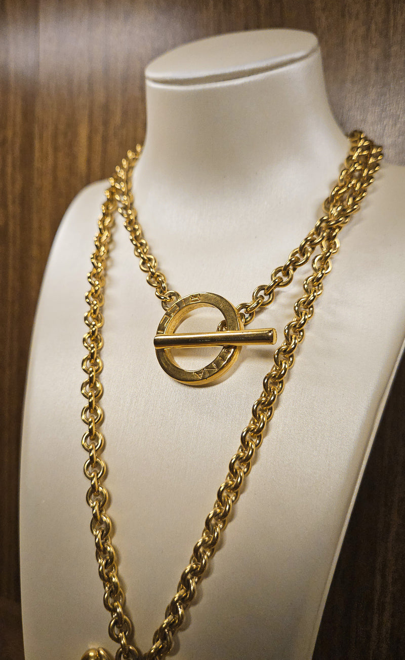 Vintage Nina Ricci Gold Bow Necklace with Amber Glass Center