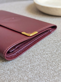 Cartier Bordeaux Leather Wallet with Gold Corners