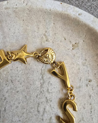 Vintage Yves Saint Laurent Gold-Tone Charm Bracelet