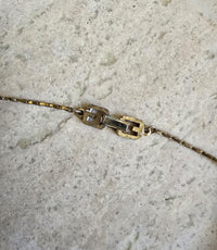 Vintage 1980 Givenchy Logo Pendant Necklace – Gold Tone with Rhinestone Border