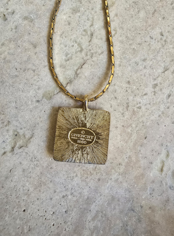 Vintage 1980 Givenchy Logo Pendant Necklace – Gold Tone with Rhinestone Border