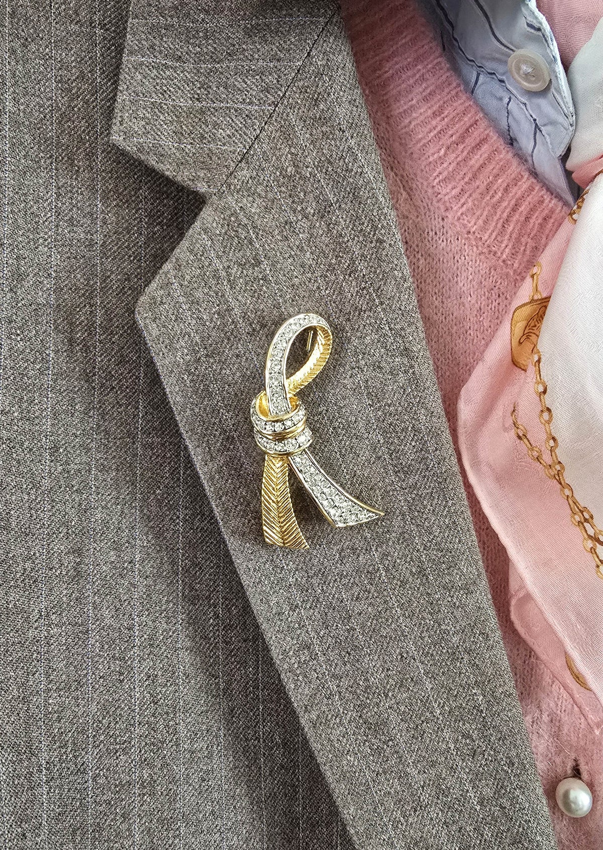 Vintage Nina Ricci Gold-Tone Ribbon Brooch with Rhinestones