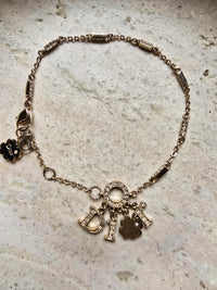 Dior Gold-Tone Charm Bracelet with Logo & Clover