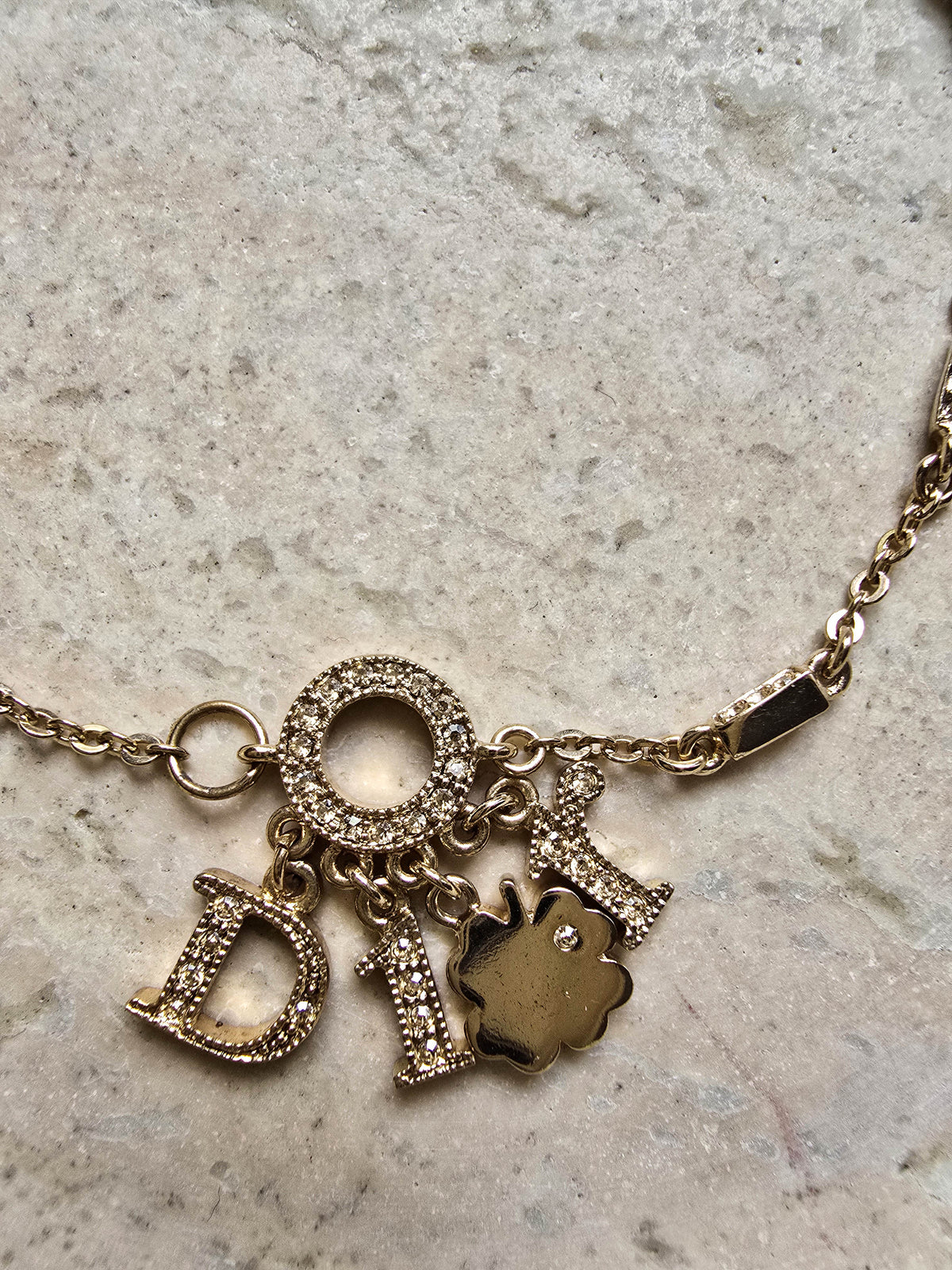 Dior Gold-Tone Charm Bracelet with Logo & Clover
