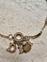 Dior Gold-Tone Charm Bracelet with Logo & Clover