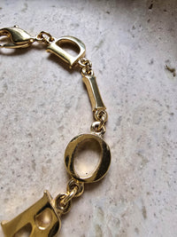 Dior Paris Gold-Tone Letter Bracelet