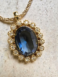 Nina Ricci Gold-Tone Necklace with Blue Crystal Pendant
