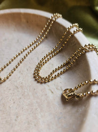 Collier Sautoir Dior Chaine à Bille Cœur Plaqué Or et Strass Rubis