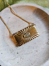 Collier Nina Ricci pendentif enveloppe & crystal transparent