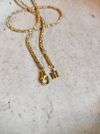 Collier Nina Ricci pendentif enveloppe & crystal transparent