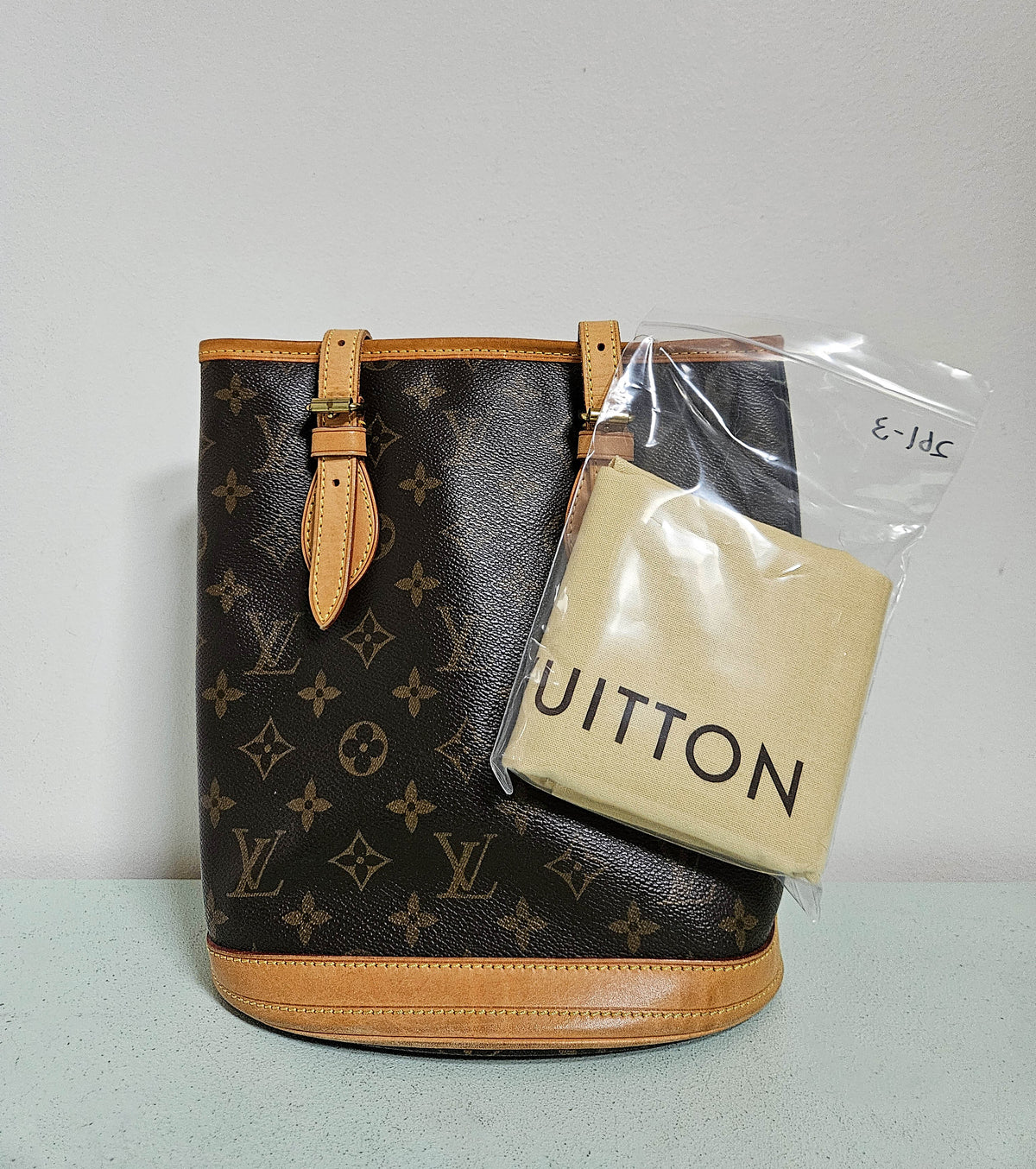 Sac Louis Vuitton Bucket en Toile Monogram et Cuir Vachette Beige