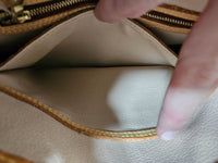 Sac Louis Vuitton Bucket en Toile Monogram et Cuir Vachette Beige