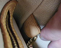 Sac Louis Vuitton Bucket en Toile Monogram et Cuir Vachette Beige