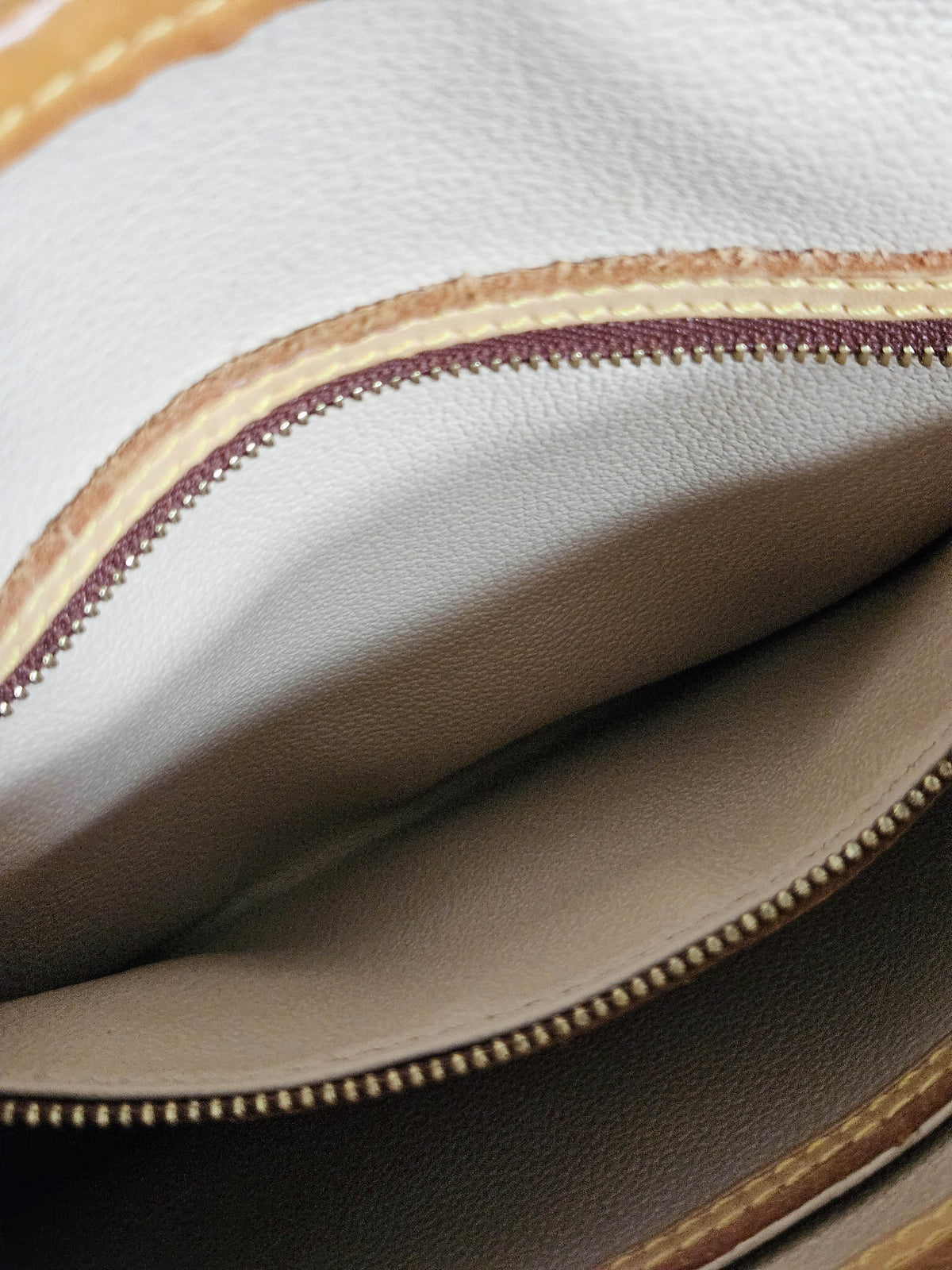 Sac Louis Vuitton Bucket en Toile Monogram et Cuir Vachette Beige