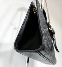 Sac Gucci Emily Guccissima en cuir noir embossé