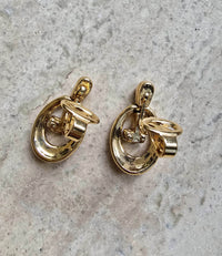 Boucles d’oreilles clip Nina Ricci vintage – Bi-matière doré et argenté, logo NR