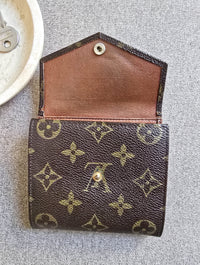 Double Portefeuille Louis Vuitton Monogrammé en Toile Enduite