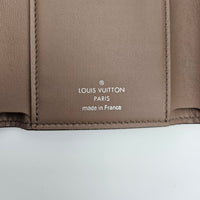 Portefeuille Louis Vuitton Capucines Compact Trifold