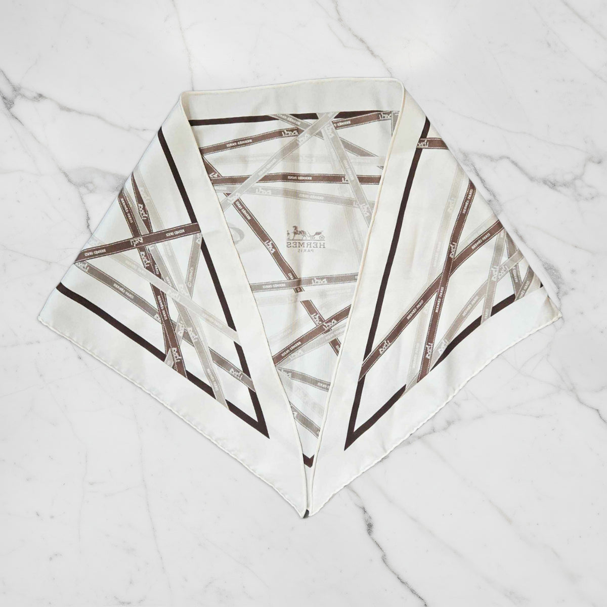 Hermès Triangle Scarf – Ribbon Motif in Neutrals