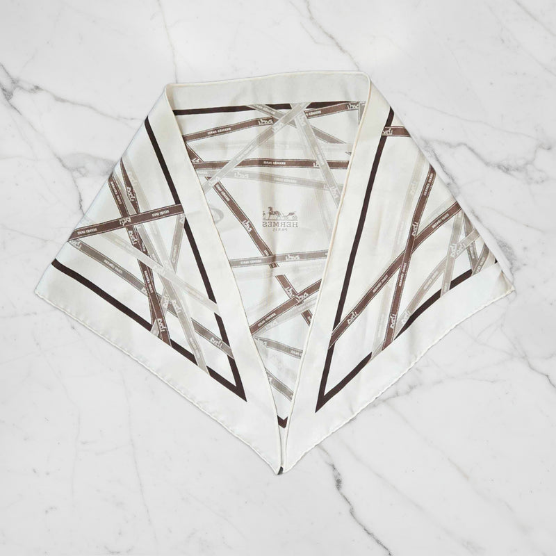 Hermès Triangle Scarf – Ribbon Motif in Neutrals