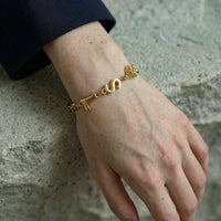 Vintage Yves Saint Laurent Gold-Tone Charm Bracelet