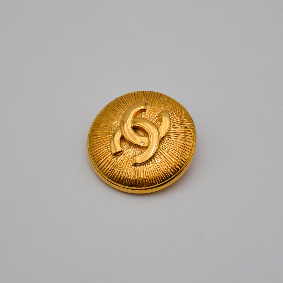 Broche Chanel CC vintage 1988