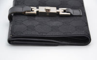 Portefeuille Gucci Vintage Toile GG Noir · Fermoir Jackie