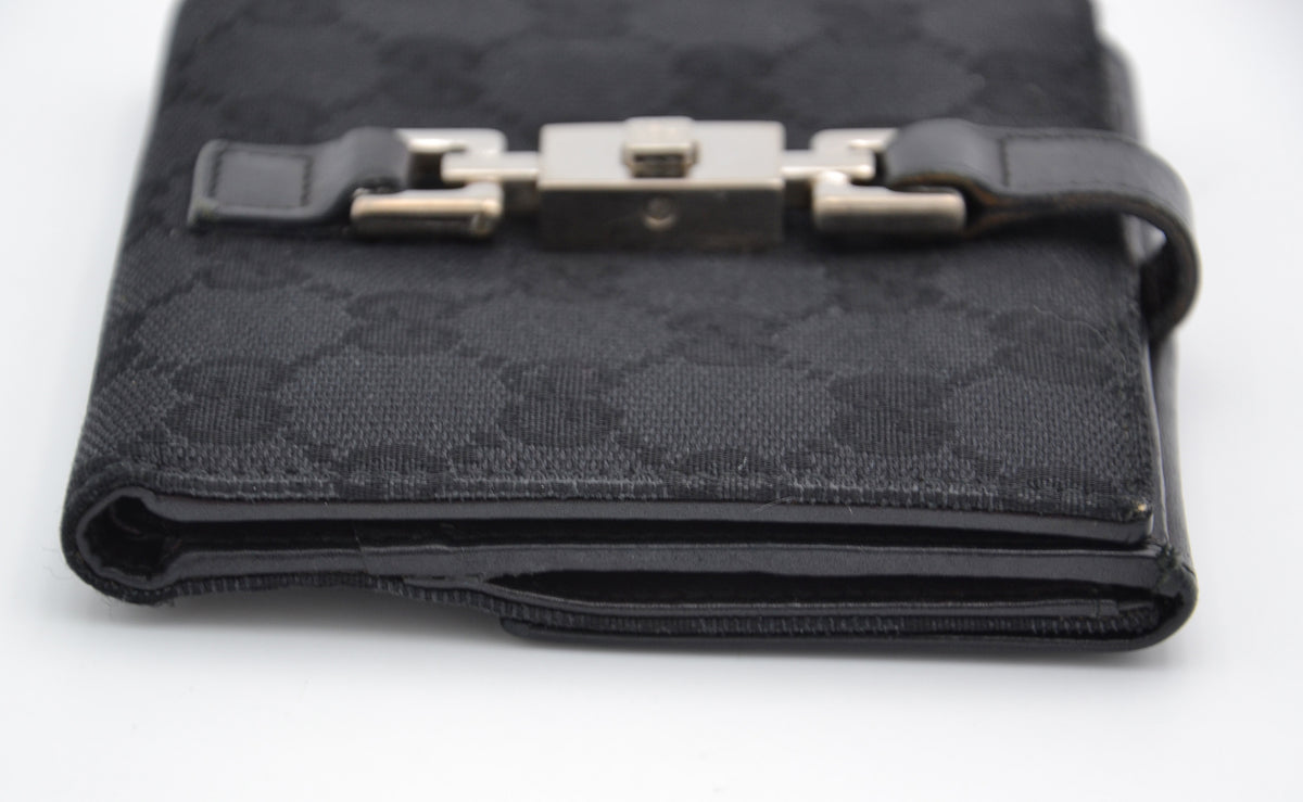 Portefeuille Gucci Vintage Toile GG Noir · Fermoir Jackie