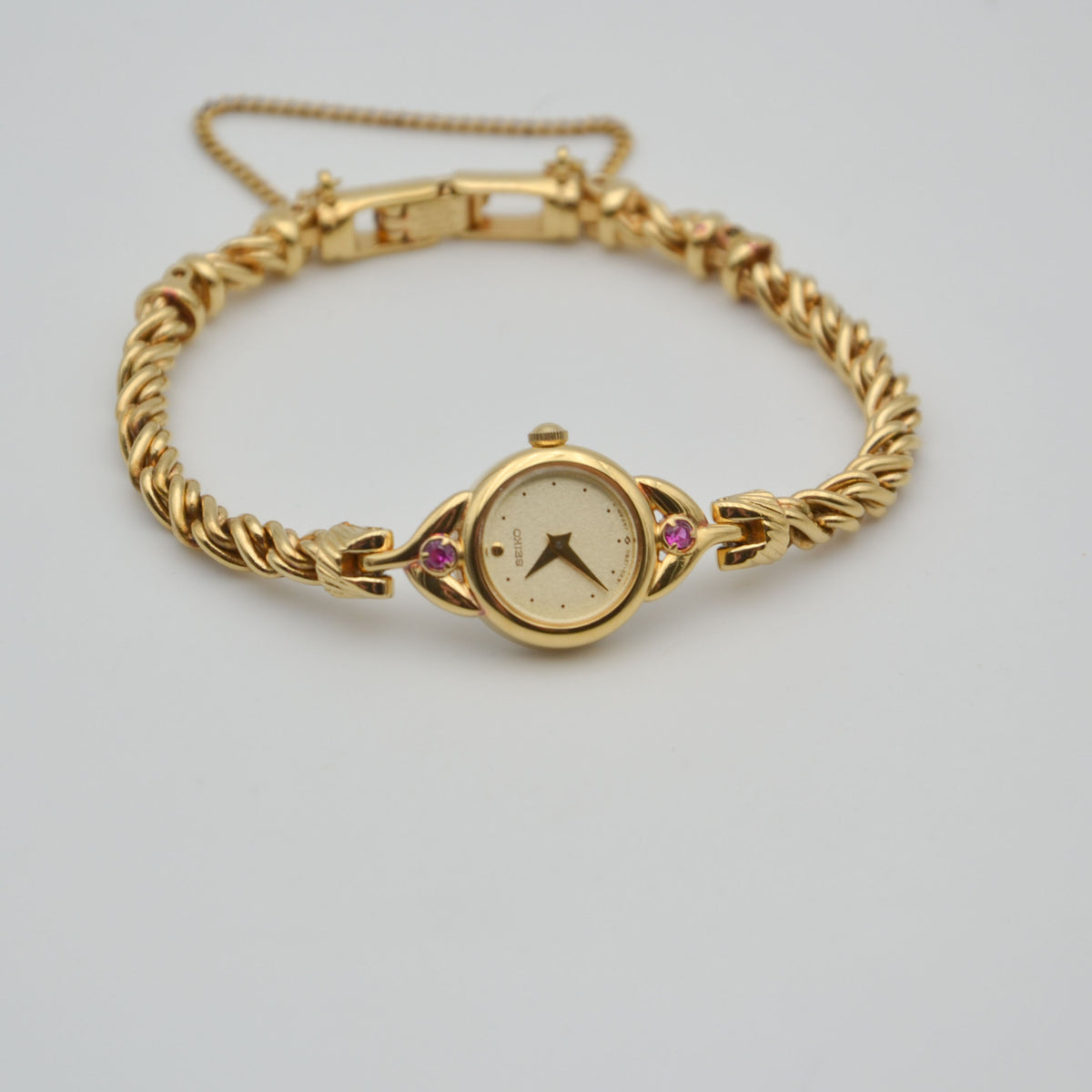Montre Seiko Vintage Dorée à Cabochons Roses