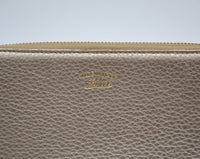 Portefeuille Gucci cuir grainé doré Bamboo zippy
