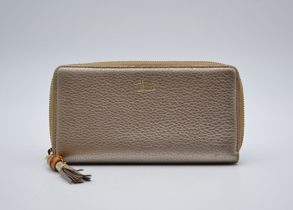 Portefeuille Gucci cuir grainé doré Bamboo zippy