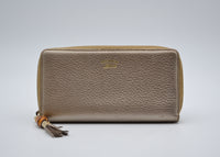 Portefeuille Gucci cuir grainé doré Bamboo zippy