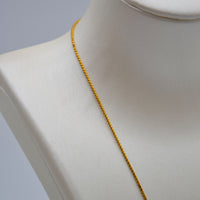 Collier Yves Saint Laurent Vintage