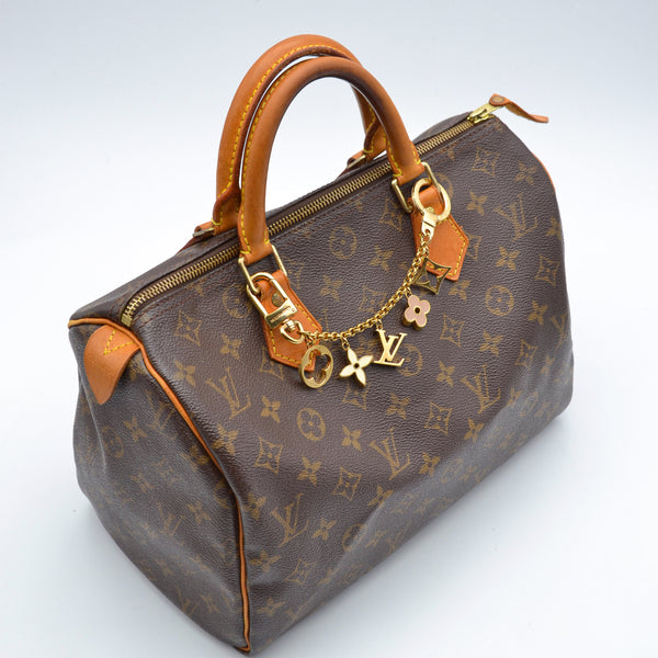 Louis Vuitton Bijou de Sac Chaîne Fleurs & Initiales LV