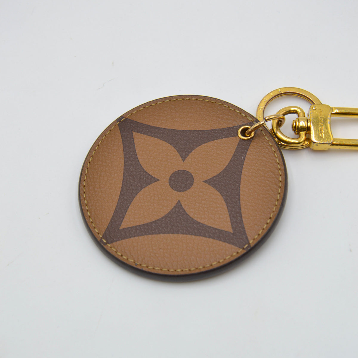 Louis Vuitton Monogram Reverse bag charm & porte-clés