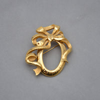 Christian Dior Broche Nœud & Médaillon Vintage