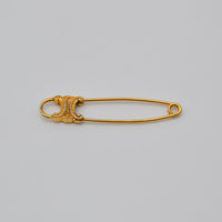 Broche Céline épingle logo Triomphe
