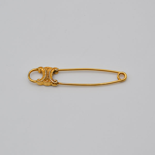 Broche Céline épingle logo Triomphe