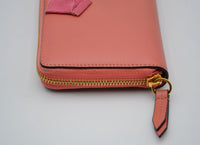 Portefeuille Gucci cuir rose avec nœud GG