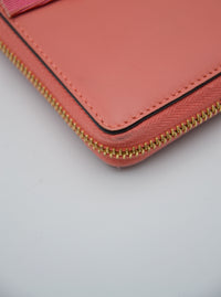 Portefeuille Gucci cuir rose avec nœud GG