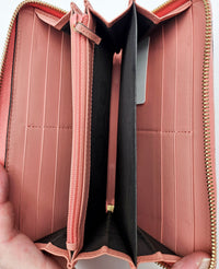 Portefeuille Gucci cuir rose avec nœud GG